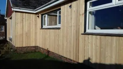 Wall made of Siberian Larch Square Yorkshire Boarding