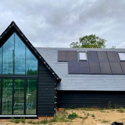 Black Featheredge External Cladding fitted with a front view of fitted glass